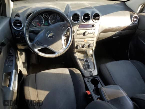 2015 Chevrolet Captiva Sport LT z VIN 3GNAL3EK4FS511548, wystawiony jako Copart lot #84188124 z przebiegiem 275 071 mil mil oraz Czysty tytuł • Clean title. Historia ofert i sprzedaży dostępna na DreamBid. Obrazek 8.