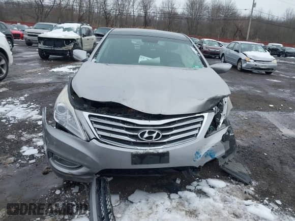 2014 Hyundai Azera Limited with VIN KMHFH4JG6EA361378, listed as a IAAI auction lot 41557210 with 58,561 mi miles and . Bid and sale history available at DreamBid. Image 18.