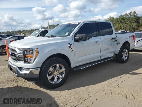 ✅ 2022 Ford F-150 XLT • VIN: 1FTFW1E82NKD60542 • Lot: 93125355. Listed on Copart with 107,499 mi. Free auction sales archive from the USA and detailed vehicle history report at DreamBid. Image 1.
