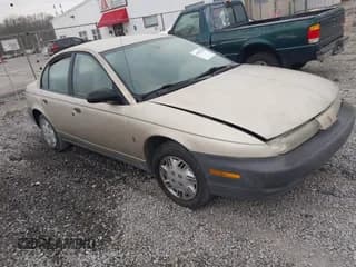 ✅ 1999 Saturn SL • VIN: 1G8ZH5282XZ273375 • Lot: 41787290. Wystawiony na IAAI z przebiegiem 230 397 mil. Bezpłatny archiwum sprzedaży aukcyjnych z USA i szczegółowy raport historii pojazdu na DreamBid. Zdjęcie 1.