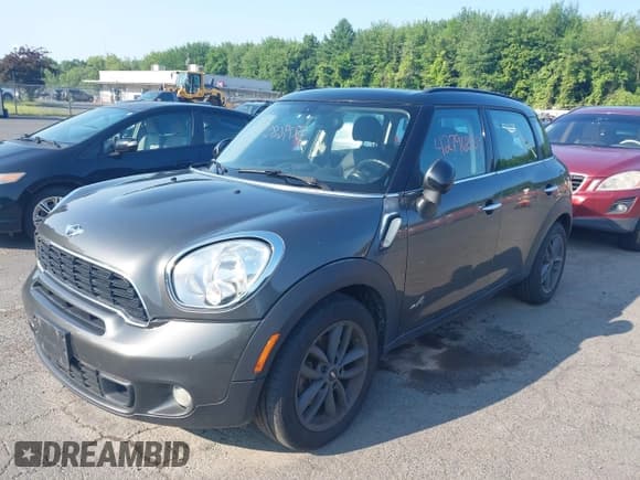 ✅ 2014 MINI Countryman S • VIN: WMWZC5C56EWP36719 • Lot: 42796859. Listed on IAAI with 133,003 mi. Free auction sales archive from the USA and detailed vehicle history report at DreamBid. Image 2.