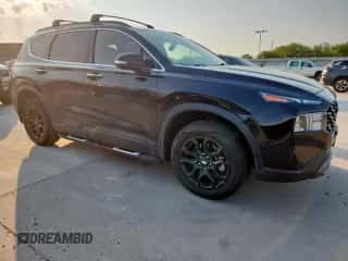 2022 Hyundai Santa Fe XRT with VIN 5NMS6DAJ8NH474551, listed as a Copart auction lot 69476765 with 30,752 mi miles and Salvage title. Bid and sale history available at DreamBid. Image 4.