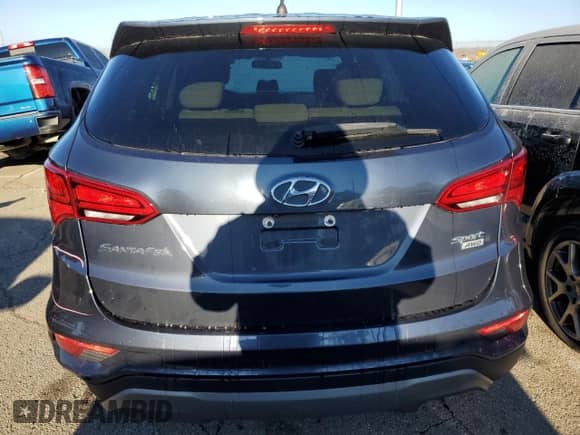 ✅ 2018 Hyundai Santa Fe 2.4L • VIN: 5NMZTDLB2JH051617 • Lot: 43172403. Wystawiony na Copart z przebiegiem 79 092 mil mil. Skorzystaj z bezpłatnego archiwum sprzedaży aukcyjnych z USA i zobacz szczegółowy raport historii pojazdu na DreamBid. Zdjęcie 6.