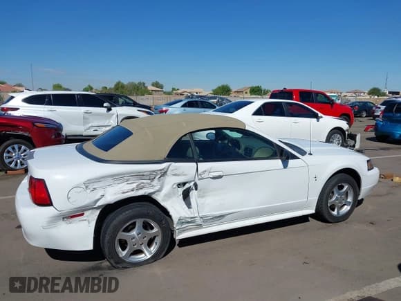 ✅ 2003 Ford Mustang Deluxe • VIN: 1FAFP44453F318830 • Лот: 43206133. Опубликован ранее на IAAI с пробегом 53 464 миль. Бесплатный доступ к архиву аукционных продаж из США и подробный отчёт об истории автомобиля на DreamBid. Изображение 6.