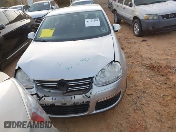 ✅ 2009 Volkswagen Jetta S • VIN: 3VWJM71KX9M097779 • Lot: 43749490. Listed on IAAI with 75,266 mi. Free auction sales archive from the USA and detailed vehicle history report at DreamBid. Image 12.