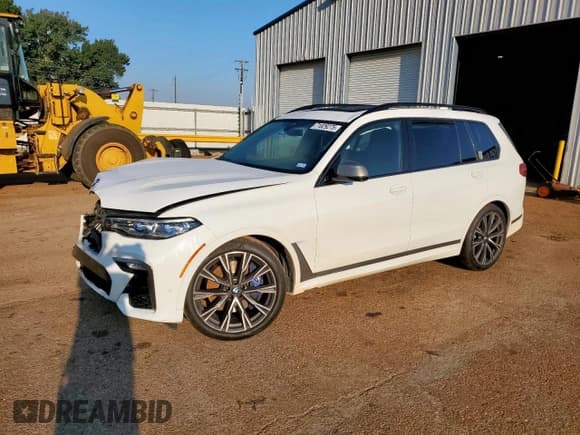 ✅ 2020 BMW X7 M50i • VIN: 5UXCX6C05L9C38130 • Lot: 71829275. Listed on Copart with 86,202 mi. Free auction sales archive from the USA and detailed vehicle history report at DreamBid. Image 1.