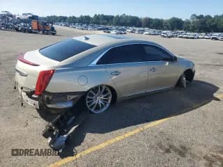 ✅ 2013 Cadillac XTS Platinum • VIN: 2G61U5S30D9139413 • Лот: 87412145. Опубликован ранее на Copart с пробегом 115 627 миль. Бесплатный доступ к архиву аукционных продаж из США и подробный отчёт об истории автомобиля на DreamBid. Изображение 3.