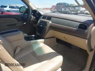 2012 Chevrolet Suburban LT z VIN 1GNSKJE72CR262365, wystawiony jako IAAI lot #42550644 z przebiegiem 159 459 mil mil oraz . Historia ofert i sprzedaży dostępna na DreamBid. Obrazek 5.