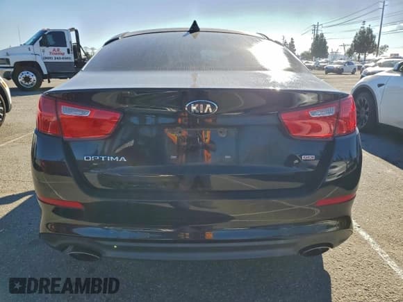 ✅ 2014 Kia Optima LX • VIN: 5XXGM4A75EG329580 • Lot: 95564365. Listed on Copart with 128,899 mi. Free auction sales archive from the USA and detailed vehicle history report at DreamBid. Image 6.