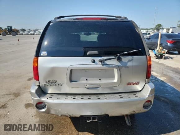 ✅ 2005 GMC Envoy SLE • VIN: 1GKDS13S152139259 • Лот: 80463415. Опубликован ранее на Copart с пробегом 197 664 миль. Бесплатный доступ к архиву аукционных продаж из США и подробный отчёт об истории автомобиля на DreamBid. Изображение 6.
