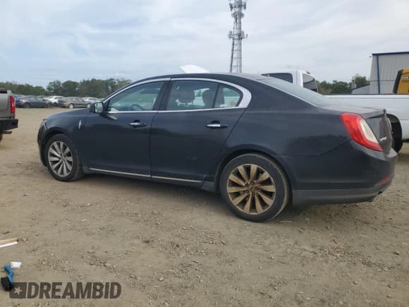 ✅ 2014 Lincoln MKS • VIN: 1LNHL9DK4EG601125 • Лот: 81664005. Опубликован ранее на Copart с пробегом 311 939 миль. Бесплатный доступ к архиву аукционных продаж из США и подробный отчёт об истории автомобиля на DreamBid. Изображение 2.