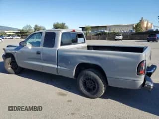 ✅ 1998 Dodge Dakota SLT • VIN: 1B7GL22X3WS647890 • Lot: 50598585. Wystawiony na Copart z przebiegiem 262 694 mil. Bezpłatny archiwum sprzedaży aukcyjnych z USA i szczegółowy raport historii pojazdu na DreamBid. Zdjęcie 2.