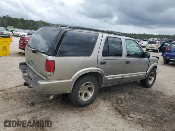 2000 Chevrolet Blazer LT z VIN 1GNCS13W4Y2165750, wystawiony jako Copart lot #78346644 z przebiegiem Nie podano mil oraz Szkoda całkowita • Salvage title. Historia ofert i sprzedaży dostępna na DreamBid. Obrazek 3.