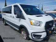 ✅ 2021 Ford Transit Passenger XL • VIN: 1FBAX2Y88MKA15155 • Lot: 41730982. Listed on IAAI with 70,357 mi. Free auction sales archive from the USA and detailed vehicle history report at DreamBid. Image 1.