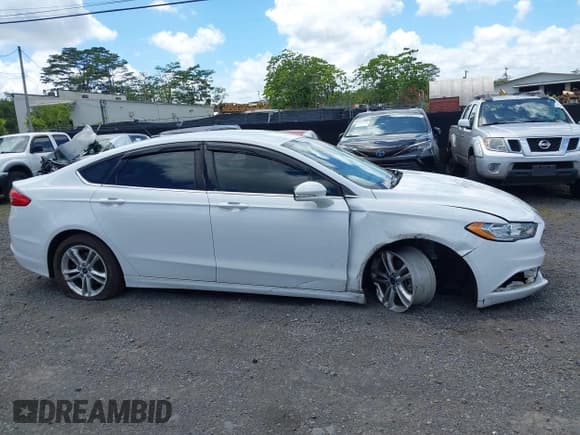 ✅ 2018 Ford Fusion SE • VIN: 3FA6P0H74JR273280 • Лот: 43291660. Опубликован ранее на IAAI с пробегом 53 809 миль. Бесплатный доступ к архиву аукционных продаж из США и подробный отчёт об истории автомобиля на DreamBid. Изображение 13.