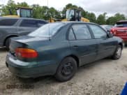 ✅ 2000 Chevrolet Prizm • VIN: 1Y1SK5284YZ411021 • Lot: 66666935. Listed on Copart with 137,188 mi. Free auction sales archive from the USA and detailed vehicle history report at DreamBid. Image 3.