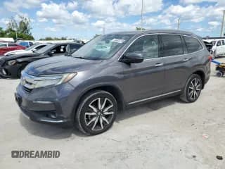 ✅ 2021 Honda Pilot Touring 8-Passenger • VIN: 5FNYF6H96MB012412 • Lot: 84603215. Listed on Copart with 123,183 mi. Free auction sales archive from the USA and detailed vehicle history report at DreamBid. Image 1.