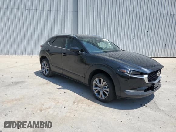 ✅ 2024 Mazda CX-30 S Premium • VIN: 3MVDMBDMXRM682702 • Lot: 59981805. Listed on Copart with 21,505 mi. Free auction sales archive from the USA and detailed vehicle history report at DreamBid. Image 4.