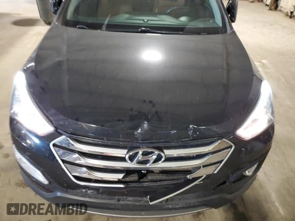 ✅ 2016 Hyundai Santa Fe • VIN: 5XYZUDLB7GG357390 • Lot: 84031745. Listed on Copart with 95,721 mi. Free auction sales archive from the USA and detailed vehicle history report at DreamBid. Image 12.