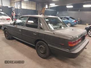 ✅ 1990 Toyota Camry • VIN: 4T1VV22E7LU030830 • Лот: 41971964. Опубликован ранее на IAAI с пробегом 164 488 миль. Бесплатный доступ к архиву аукционных продаж из США и подробный отчёт об истории автомобиля на DreamBid. Изображение 3.