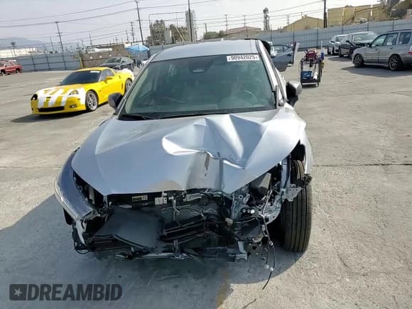 ✅ 2023 Toyota Corolla Cross Hybrid S • VIN: 7MUFBABG5PV017023 • Lot: 90942025. Listed on Copart with 18,740 mi. Free auction sales archive from the USA and detailed vehicle history report at DreamBid. Image 14.