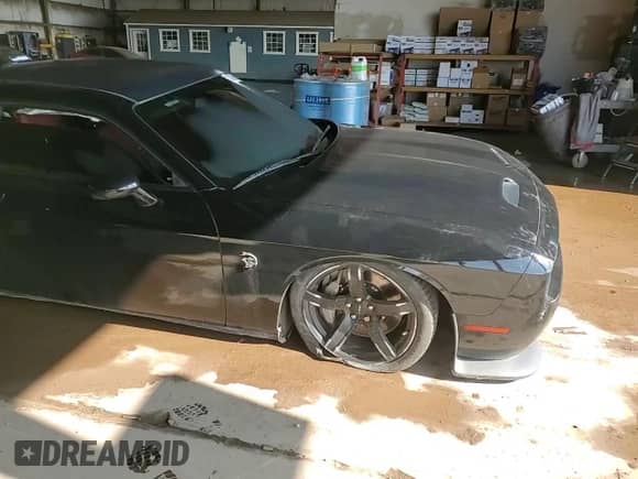 2021 Dodge Challenger SRT Hellcat с VIN 2C3CDZC9XMH601650, выставлен на аукционе Copart как лот 70405545 с пробегом 33 571 миль миль и Списание • Salvage title. История ставок и продаж доступна на DreamBid. Изображение 13.