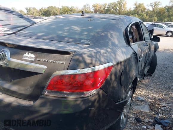 ✅ 2013 Buick LaCrosse Premium 2 • VIN: 1G4GH5G35DF178411 • Lot: 40570938. Listed on IAAI with Not provided. Free auction sales archive from the USA and detailed vehicle history report at DreamBid. Image 4.