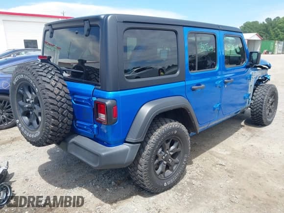 ✅ 2023 Jeep Wrangler Sport S • VIN: 1C4HJXDN4PW543700 • Lot: 42717039. Listed on IAAI with 21,061 mi. Free auction sales archive from the USA and detailed vehicle history report at DreamBid. Image 4.