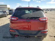 ✅ 2015 Jeep Cherokee Trailhawk • VIN: 1C4PJMBS8FW549081 • Lot: 92130325. Listed on Copart with 157,279 mi. Free auction sales archive from the USA and detailed vehicle history report at DreamBid. Image 6.