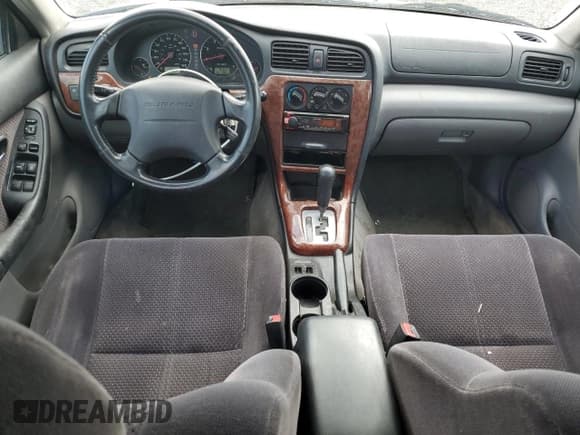 ✅ 2004 Subaru Legacy L • VIN: 4S3BH625147305291 • Lot: 66190405. Listed on Copart with 166,625 mi. Free auction sales archive from the USA and detailed vehicle history report at DreamBid. Image 8.