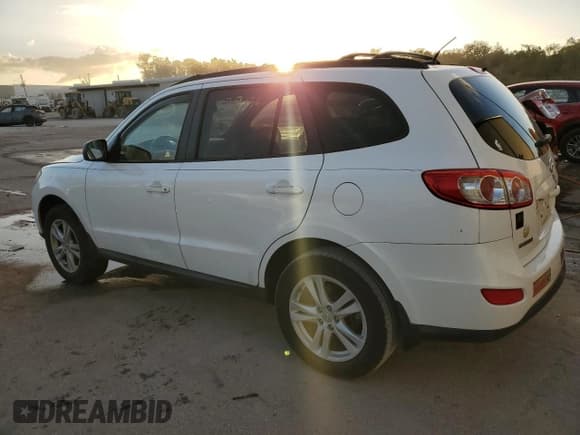 ✅ 2010 Hyundai Santa Fe GLS • VIN: 5NMSG3AB6AH402502 • Lot: 76736364. Listed on Copart with 113,425 mi. Free auction sales archive from the USA and detailed vehicle history report at DreamBid. Image 2.