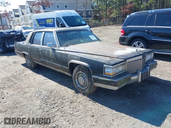 ✅ 1992 Cadillac Brougham • VIN: 1G6DW5477NR703007 • Лот: 41570312. Опубликован ранее на IAAI с пробегом 106 453 миль. Бесплатный доступ к архиву аукционных продаж из США и подробный отчёт об истории автомобиля на DreamBid. Изображение 1.
