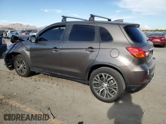 2019 Mitsubishi Outlander ES z VIN JA4AP3AU7KU027785, wystawiony jako Copart lot #71932825 z przebiegiem 63 159 mil mil oraz Szkoda całkowita • Salvage title. Historia ofert i sprzedaży dostępna na DreamBid. Obrazek 2.