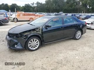 ✅ 2013 Toyota Camry LE • VIN: 4T1BD1FK2DU064885 • Lot: 87104545. Listed on Copart with 200,440 mi. Free auction sales archive from the USA and detailed vehicle history report at DreamBid. Image 1.