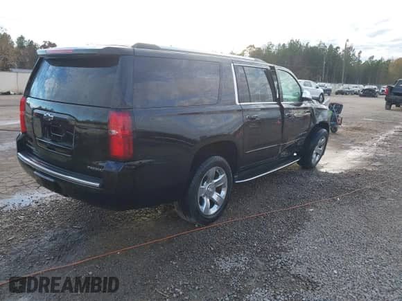 2020 Chevrolet Suburban Premier z VIN 1GNSCJKC0LR121728, wystawiony jako IAAI lot #41105003 z przebiegiem 43 820 mil mil oraz . Historia ofert i sprzedaży dostępna na DreamBid. Obrazek 4.