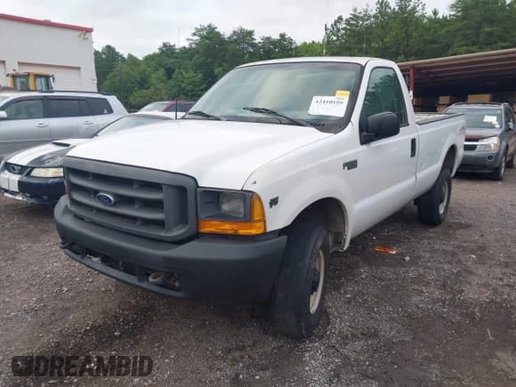 ✅ 1999 Ford F-250 XL • VIN: 1FTNF21L6XEC28879 • Lot: 42410159. Listed on IAAI with 196,735 mi. Free auction sales archive from the USA and detailed vehicle history report at DreamBid. Image 2.