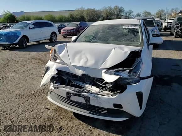 2021 Toyota Prius L Eco с VIN JTDKAMFU6M3142123, выставлен на аукционе Copart как лот 55076445 с пробегом 68 256 миль миль и Списание • Salvage title. История ставок и продаж доступна на DreamBid. Изображение 13.