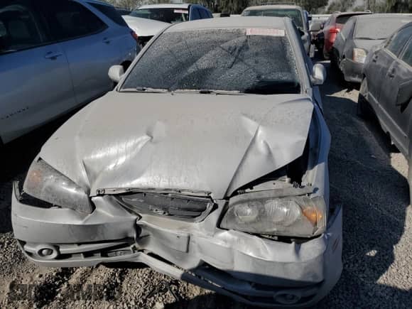 2004 Hyundai Elantra GLS with VIN KMHDN46D24U718888, listed as a Copart auction lot 66443744 with Not provided miles and Salvage title. Bid and sale history available at DreamBid. Image 5.