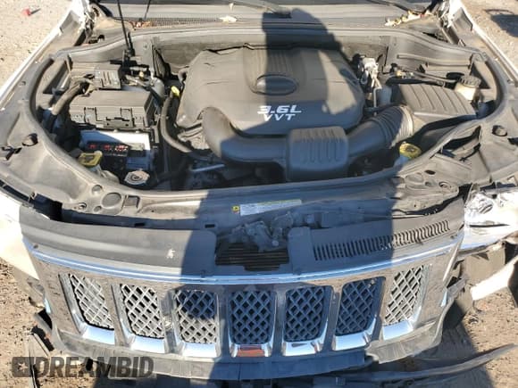 ✅ 2012 Jeep Grand Cherokee Overland • VIN: 1C4RJFCG3CC345994 • Lot: 86448425. Listed on Copart with 126,138 mi. Free auction sales archive from the USA and detailed vehicle history report at DreamBid. Image 12.