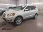 2012 Hyundai Santa Fe SE with VIN 5XYZHDAG5CG129742, listed as a IAAI auction lot 43241041 with 95,818 mi miles and . Bid and sale history available at DreamBid. Image 2.