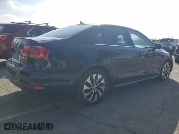 ✅ 2013 Volkswagen Jetta Hybrid • VIN: 3VW637AJ8DM229396 • Lot: 82705825. Wystawiony na Copart z przebiegiem 122 198 mil. Bezpłatny archiwum sprzedaży aukcyjnych z USA i szczegółowy raport historii pojazdu na DreamBid. Zdjęcie 3.