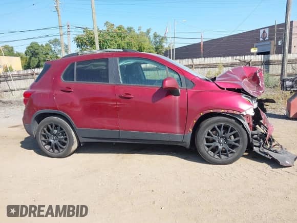 2021 Chevrolet Trax LT z VIN KL7CJLSB1MB324480, wystawiony jako IAAI lot #43222826 z przebiegiem 91 008 mil mil oraz . Historia ofert i sprzedaży dostępna na DreamBid. Obrazek 13.