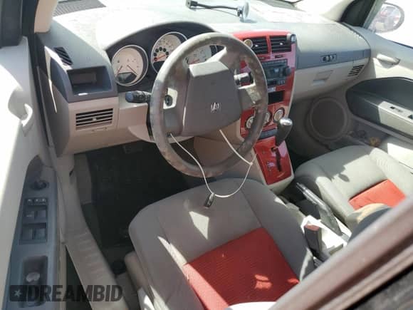 2007 Dodge Caliber SXT z VIN 1B3HB48B77D125530, wystawiony jako Copart lot #75508494 z przebiegiem Nie podano mil oraz Nie do naprawy • Non repairable. Historia ofert i sprzedaży dostępna na DreamBid. Obrazek 8.