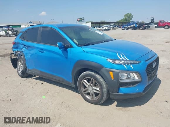 ✅ 2019 Hyundai Kona SE • VIN: KM8K12AA0KU268210 • Лот: 43262556. Опубликован ранее на IAAI с пробегом 86 696 миль. Бесплатный доступ к архиву аукционных продаж из США и подробный отчёт об истории автомобиля на DreamBid. Изображение 1.