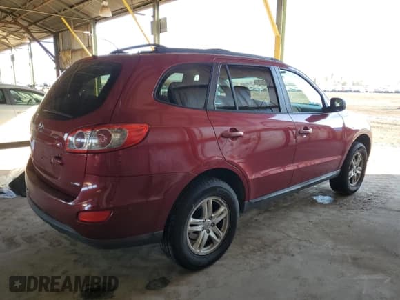 ✅ 2012 Hyundai Santa Fe GLS • VIN: 5XYZGDAB0CG124567 • Lot: 80482164. Listed on Copart with 249,148 mi. Free auction sales archive from the USA and detailed vehicle history report at DreamBid. Image 3.
