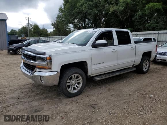 ✅ 2018 Chevrolet Silverado 1500 LT • VIN: 3GCPCREC6JG117589 • Лот: 68119944. Опубликован ранее на Copart с пробегом 143 978 миль. Бесплатный доступ к архиву аукционных продаж из США и подробный отчёт об истории автомобиля на DreamBid. Изображение 1.