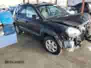 2005 Hyundai Tucson GLS with VIN KM8JN12D85U062222, listed as a Copart auction lot 77317334 with 192,758 mi miles and Salvage title. Bid and sale history available at DreamBid. Image 4.