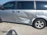 ✅ 2013 Toyota Sienna L • VIN: 5TDZK3DC1DS389841 • Lot: 43889779. Listed on IAAI with 219,343 mi. Free auction sales archive from the USA and detailed vehicle history report at DreamBid. Image 6.