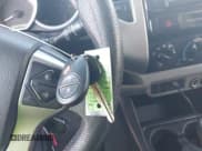 ✅ 2015 Toyota Tacoma PreRunner • VIN: 5TFKU4HN1FX006443 • Lot: 42396815. Listed on IAAI with 176,592 mi. Free auction sales archive from the USA and detailed vehicle history report at DreamBid. Image 11.