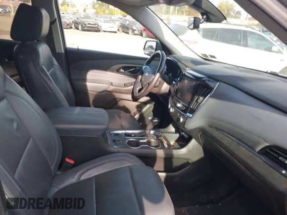 2018 Chevrolet Traverse LT with VIN 1GNERHKW1JJ285919, listed as a IAAI auction lot 43561652 with 153,238 mi miles and . Bid and sale history available at DreamBid. Image 5.